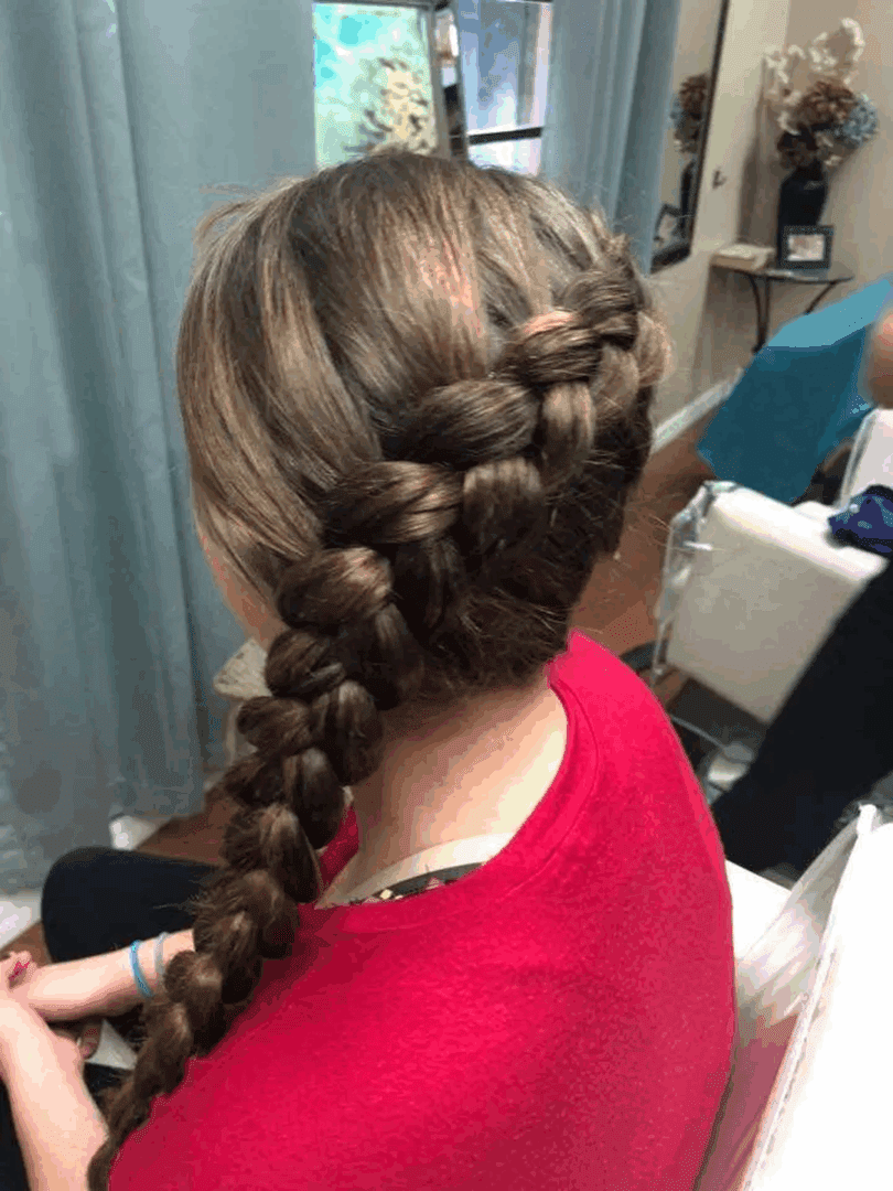 Woman with elaborate braid hairstyle