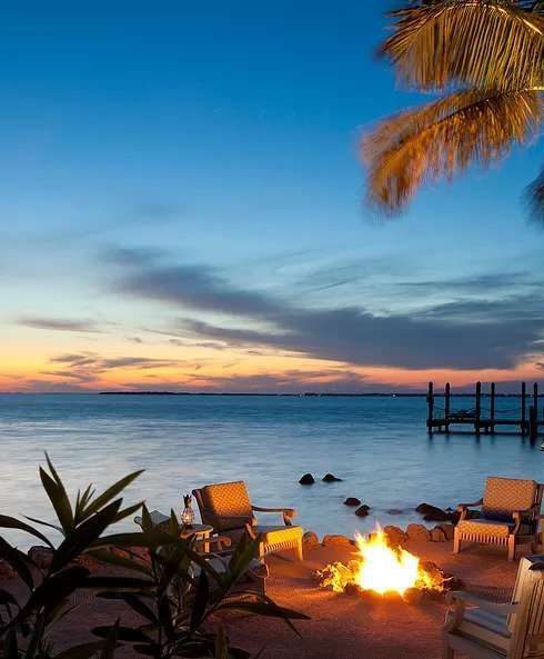 Beach bonfire at sunset