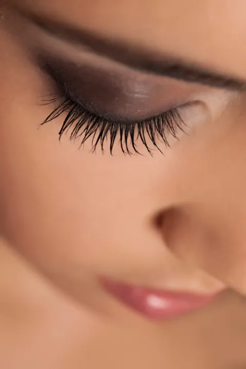 Detailed view of long eyelashes and makeup