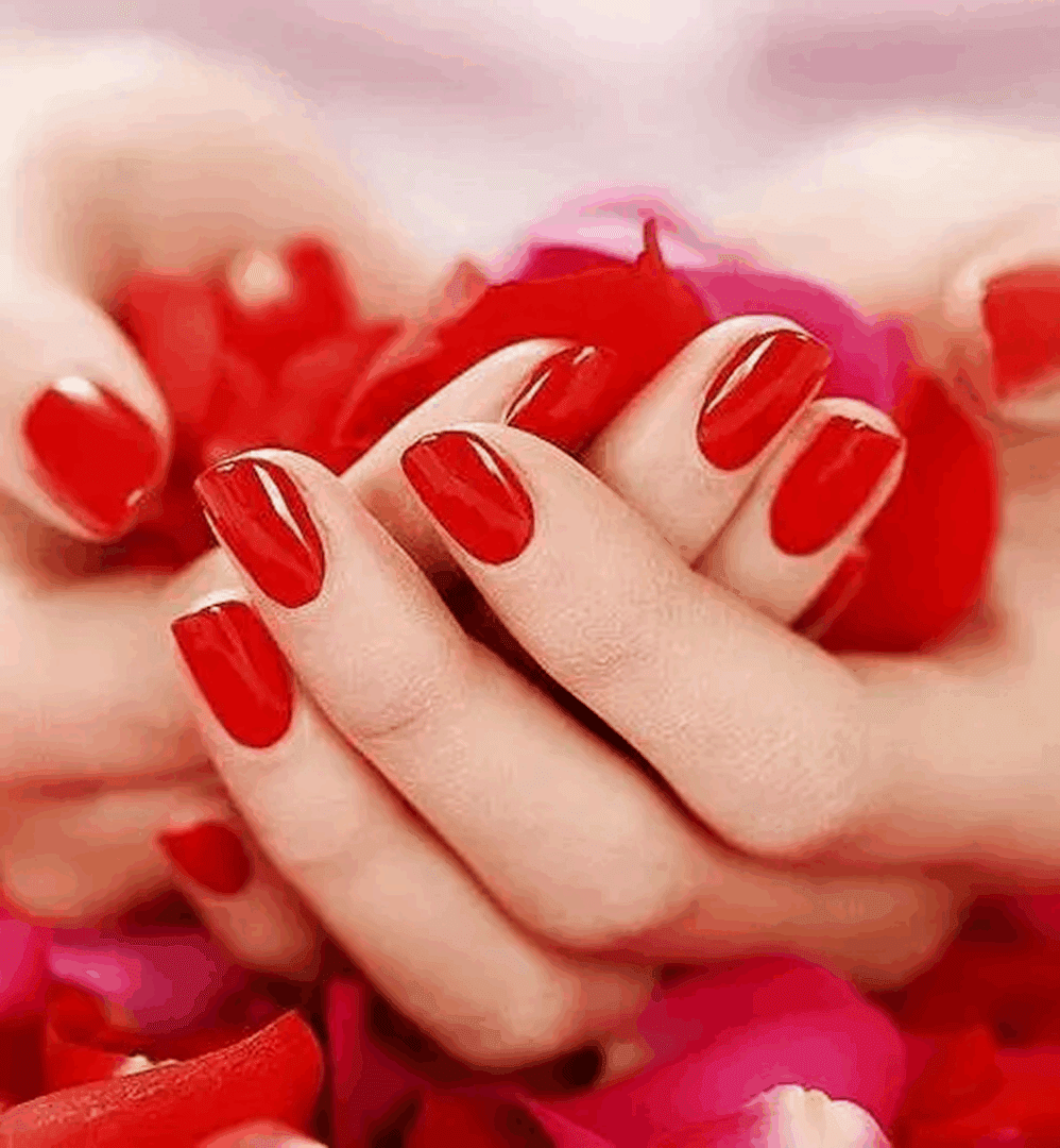 Hands with red nails and flowers