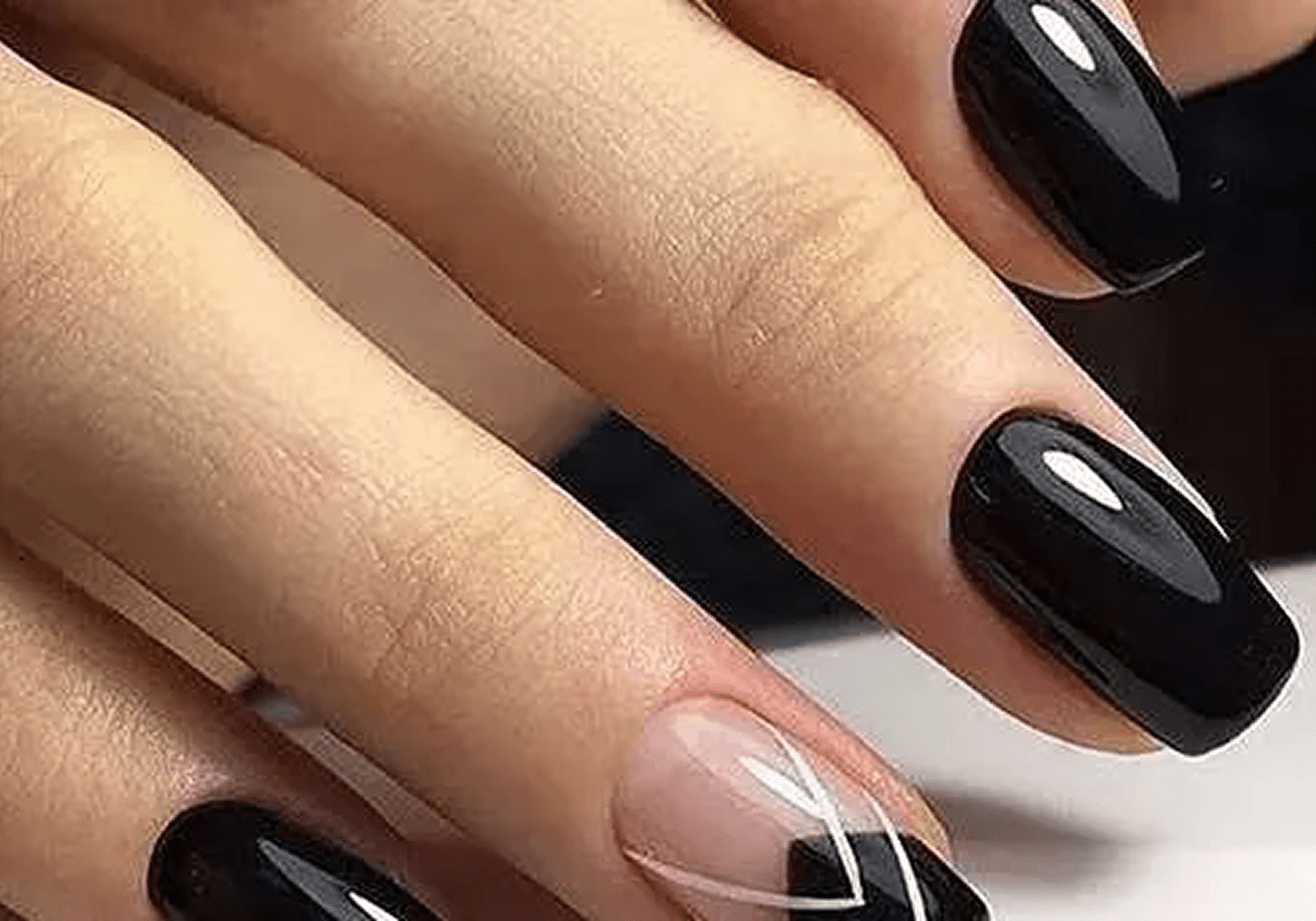 Stylish black manicure with accent nail
