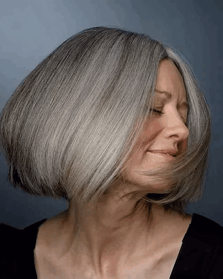 Smiling woman with silver hair