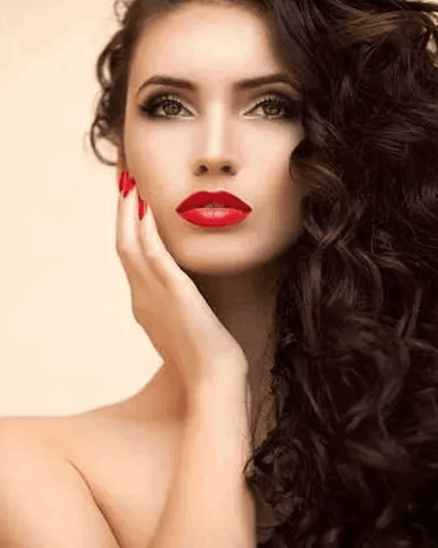 Woman with curly hair and red lips